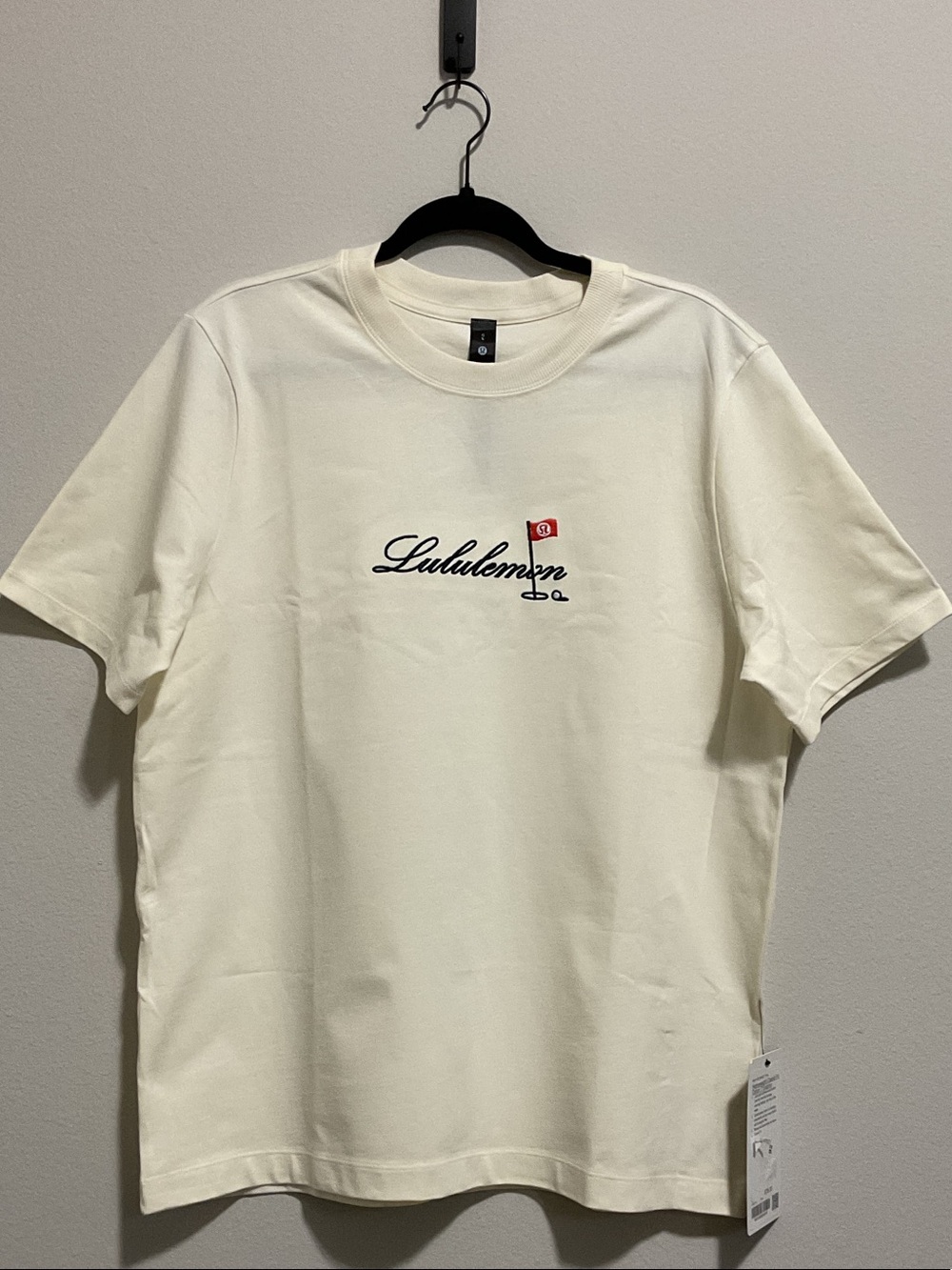lululemon athletica Cream Short Sleeve Logo Tee with Navy Script and Red Flag
